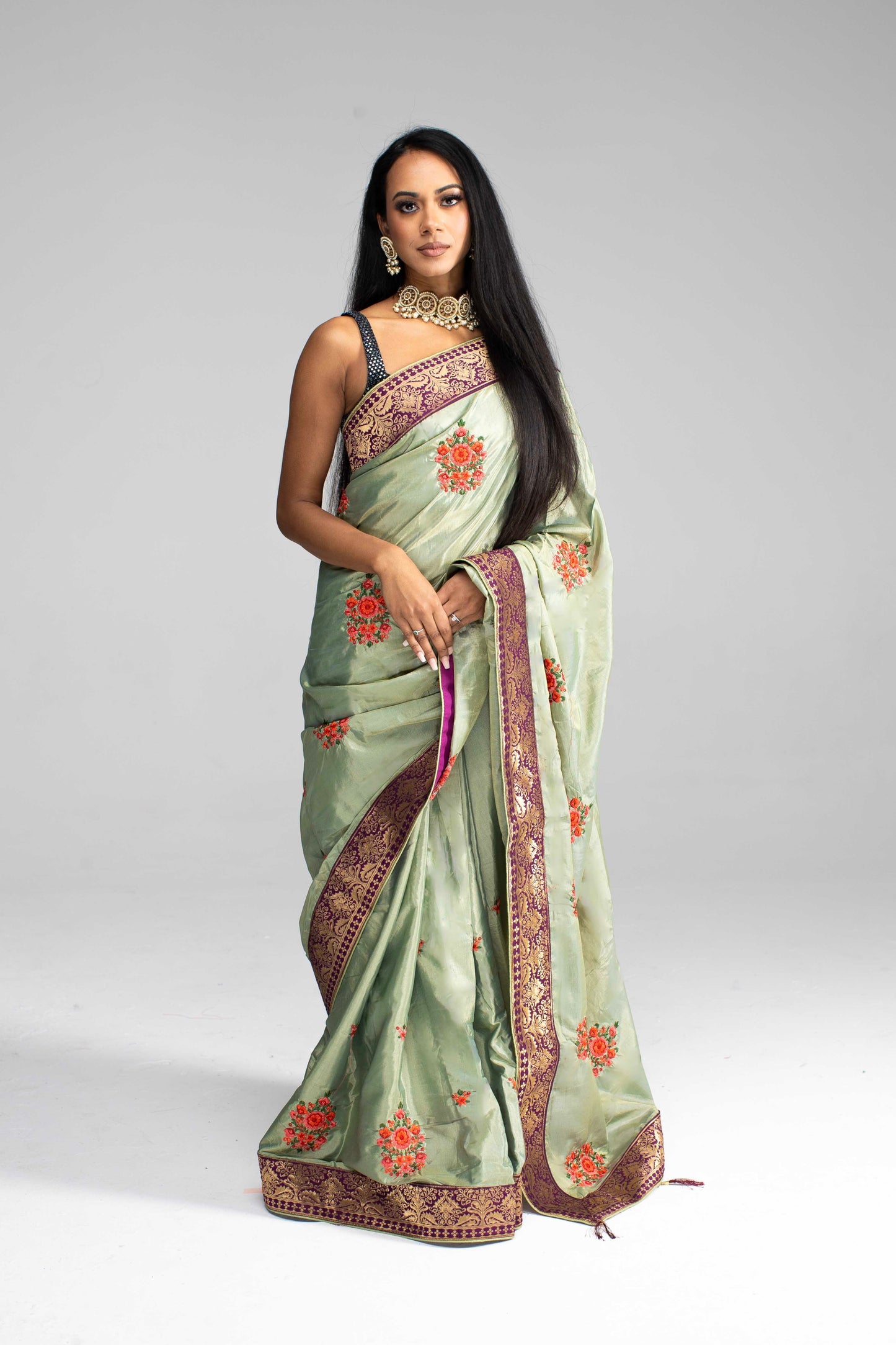 Luxurious Olive Green saree with Floral Embroidery and Contrast Border