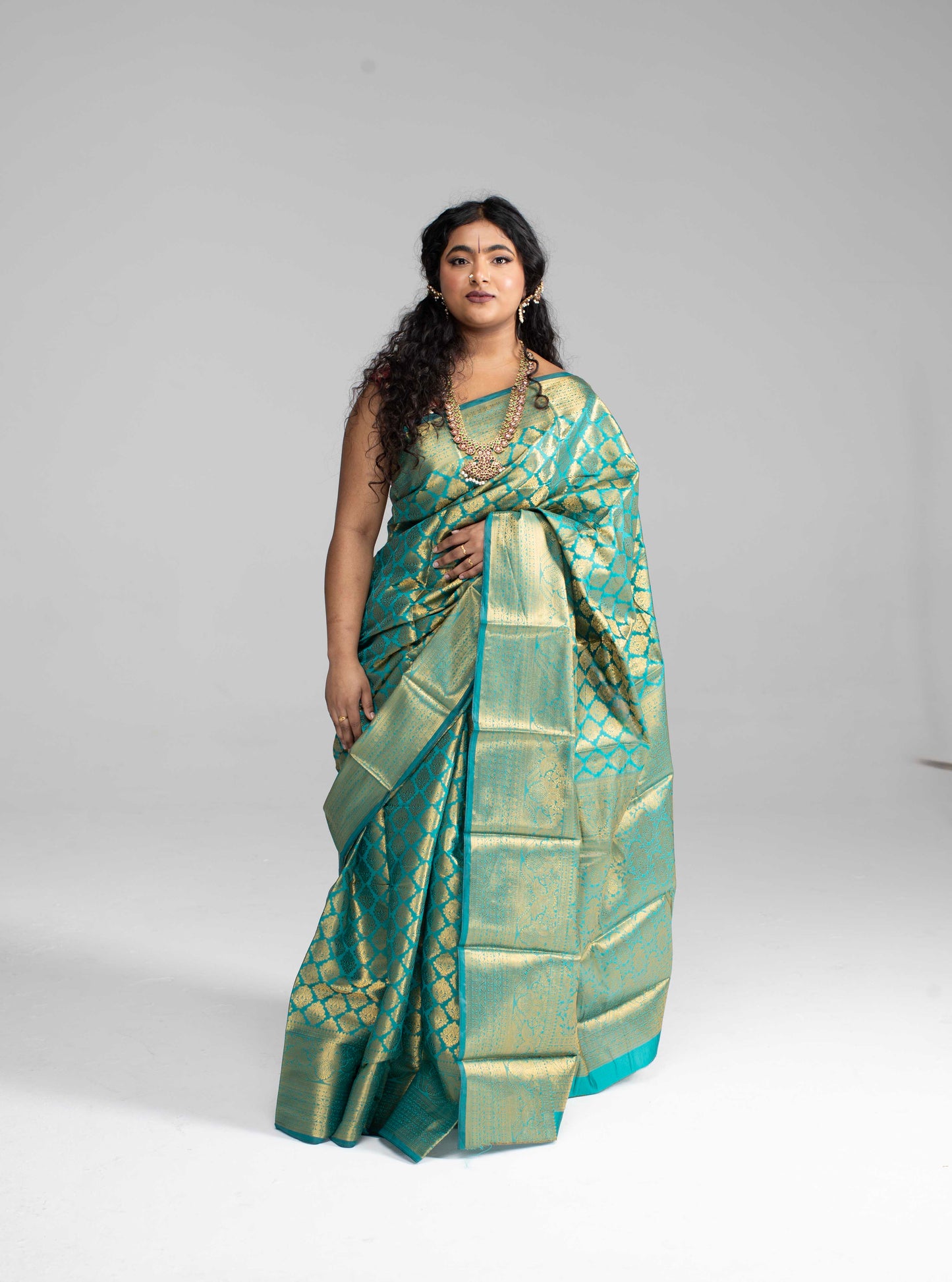 Green and gold silk saree