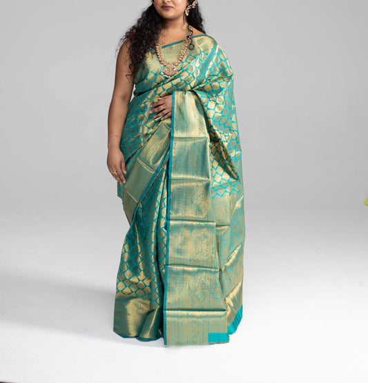 Green and gold silk saree