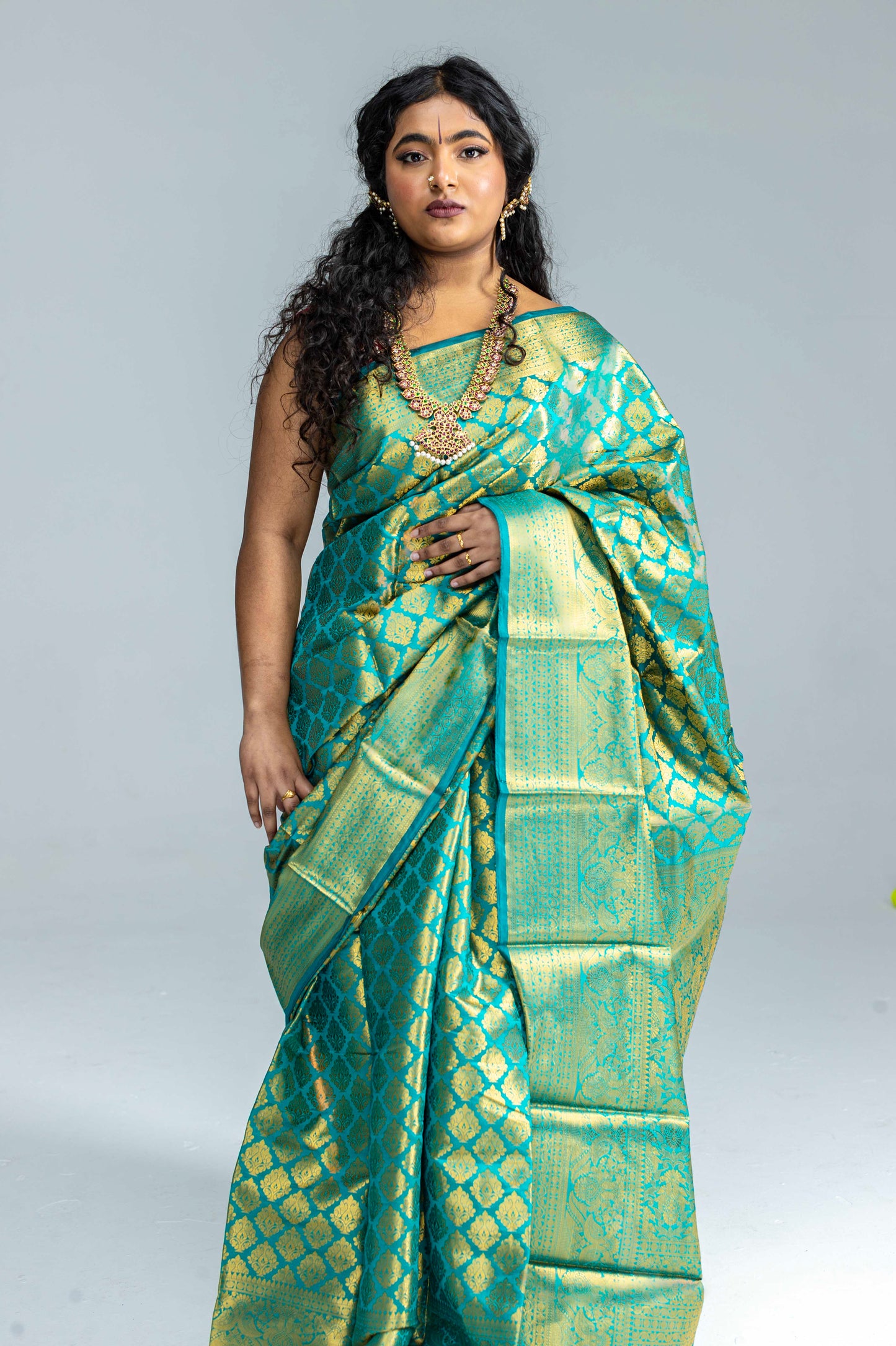 Green and gold silk saree
