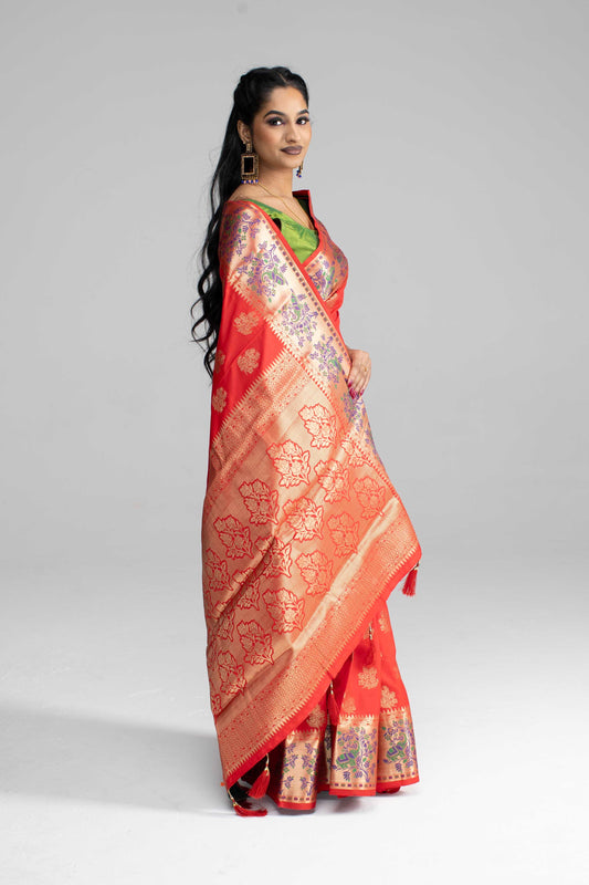 Red silk saree with large gold border