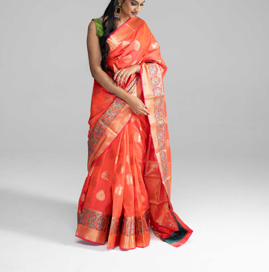 Peach silk saree with rich border