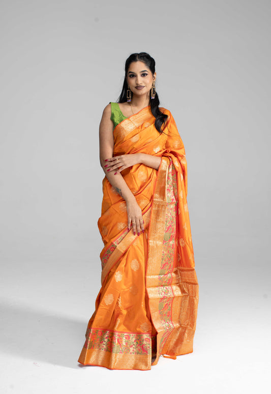 Vibrant orange silk saree with double border