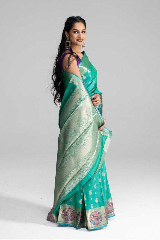 Teal Green Silk Saree with Peacock Motif Border