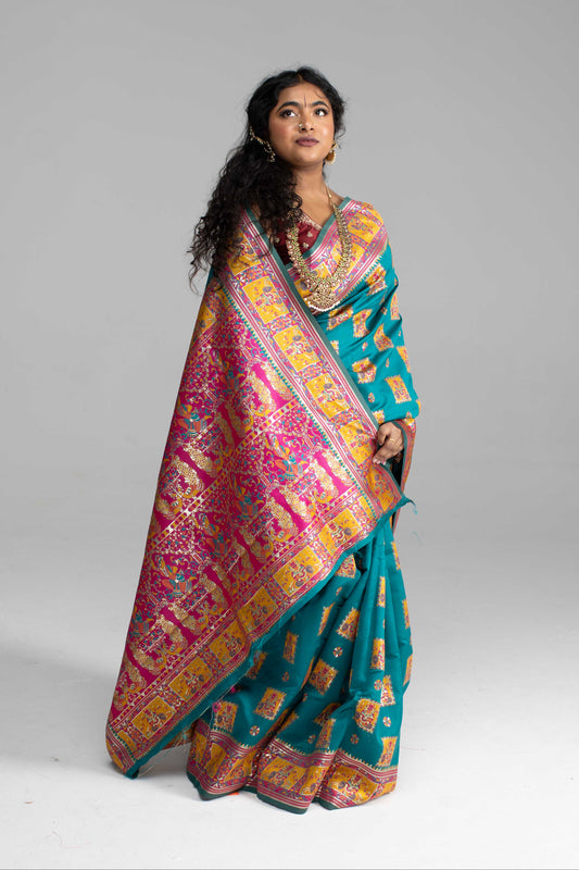 Radiant Teal & Magenta Banarasi Silk Saree with Goddess & temple motifs