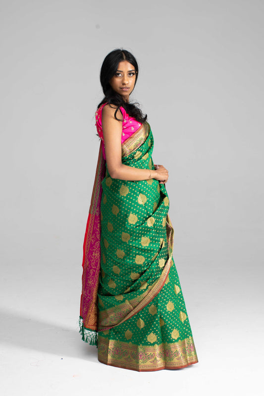 Graceful Green Silk Saree with Contrasting Pink Border
