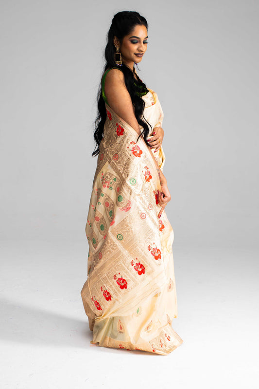 Graceful Cream Silk Saree with Gold Motif Work