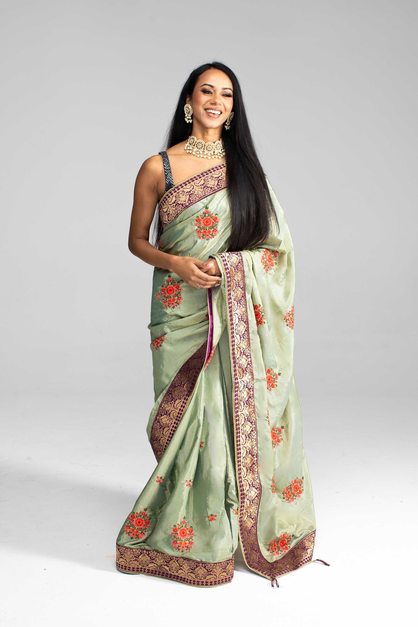 Luxurious Olive Green saree with Floral Embroidery and Contrast Border