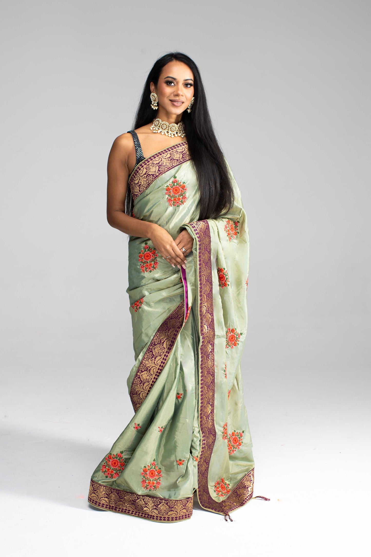 Luxurious Olive Green saree with Floral Embroidery and Contrast Border
