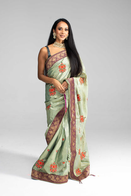 Luxurious Olive Green saree with Floral Embroidery and Contrast Border