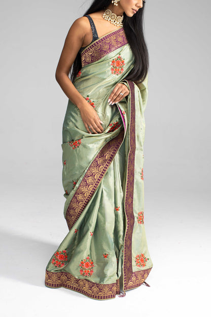 Luxurious Olive Green saree with Floral Embroidery and Contrast Border