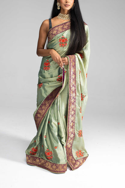 Luxurious Olive Green saree with Floral Embroidery and Contrast Border