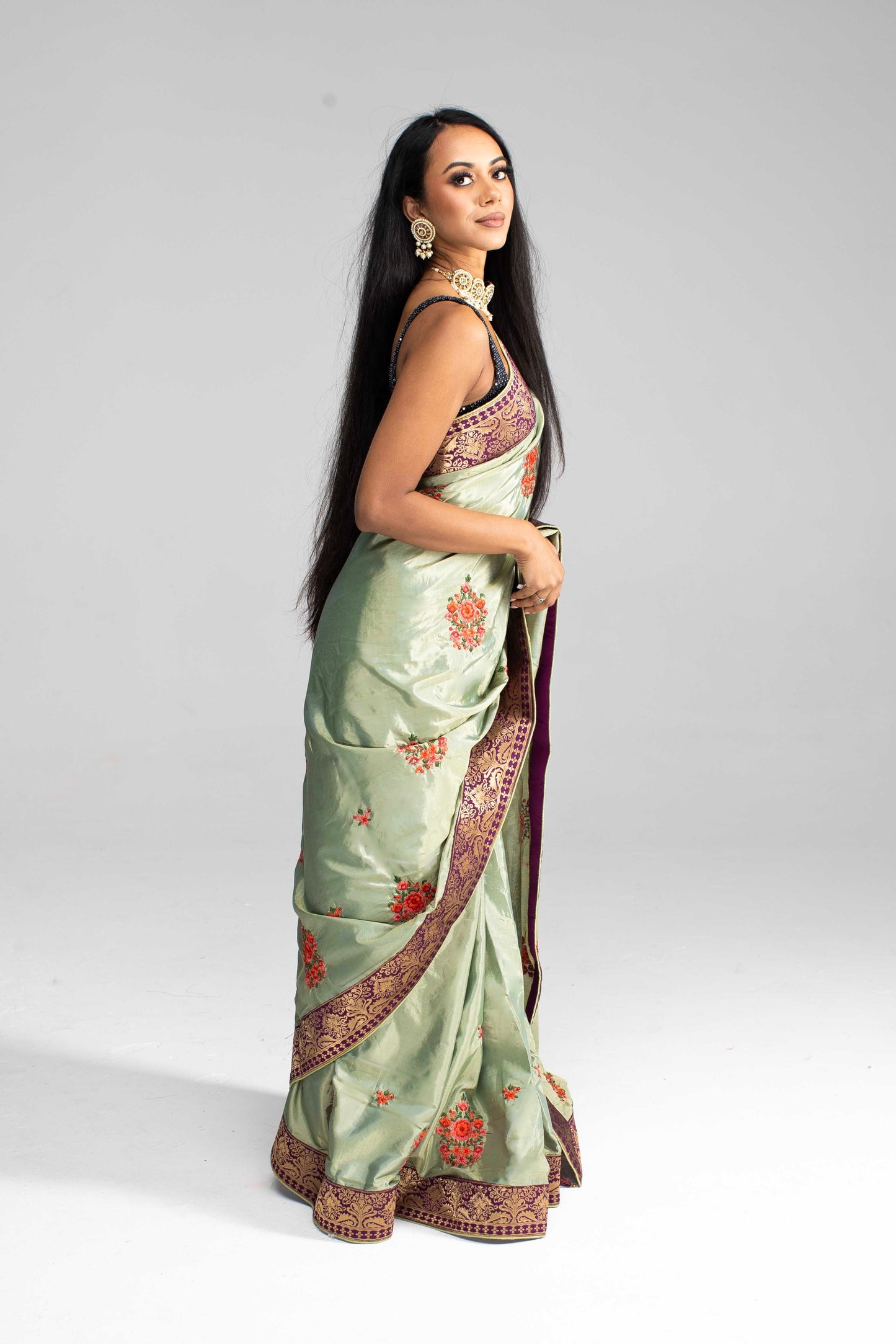 Luxurious Olive Green saree with Floral Embroidery and Contrast Border
