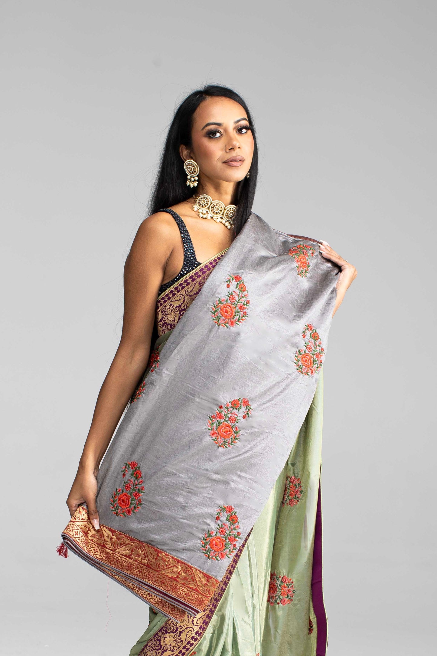 Luxurious Olive Green saree with Floral Embroidery and Contrast Border