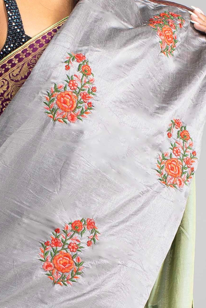 Luxurious Olive Green saree with Floral Embroidery and Contrast Border