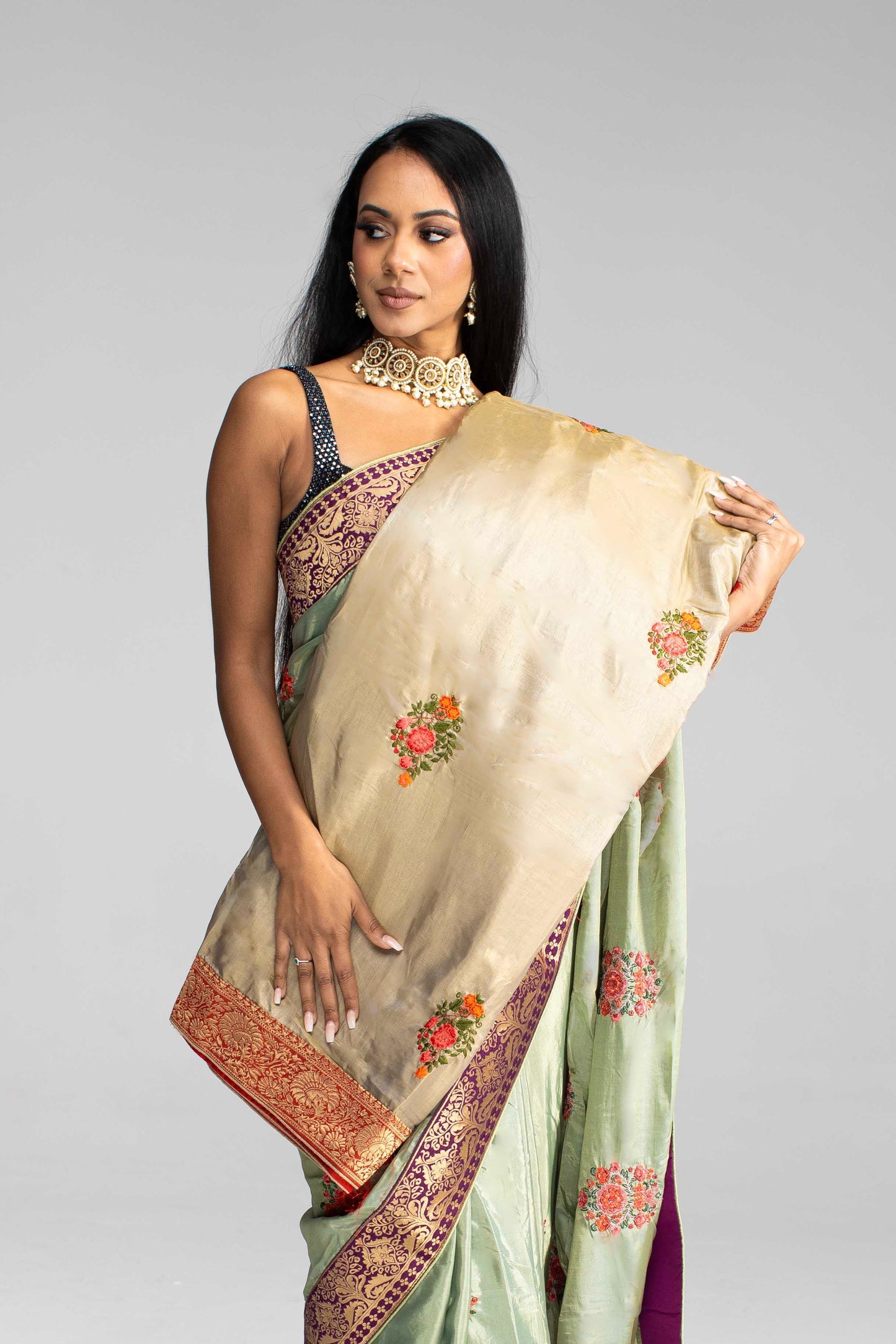 Luxurious Olive Green saree with Floral Embroidery and Contrast Border